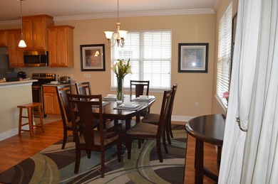 Beautiful home in quaint, white-picket-fenced, gated community on Fairway Oaks at Magnolia Golf Course in Florida - for sale on GolfHomes.com, golf home, golf lot