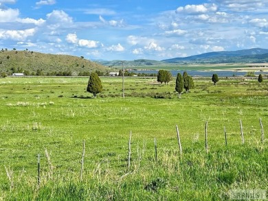 Overlooking beautiful Alexander Resevoir this 5.40 acre lot has on Oregon Trail Country Club in Idaho - for sale on GolfHomes.com, golf home, golf lot