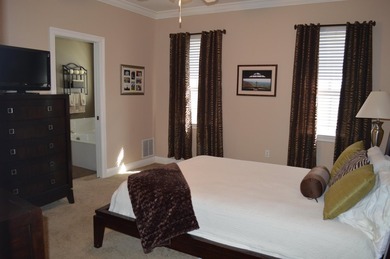 Beautiful home in quaint, white-picket-fenced, gated community on Fairway Oaks at Magnolia Golf Course in Florida - for sale on GolfHomes.com, golf home, golf lot