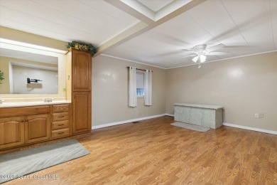Welcome to Barefoot Bay! This 2 bedroom, 2 bath home is walking on Barefoot Bay Golf Course in Florida - for sale on GolfHomes.com, golf home, golf lot