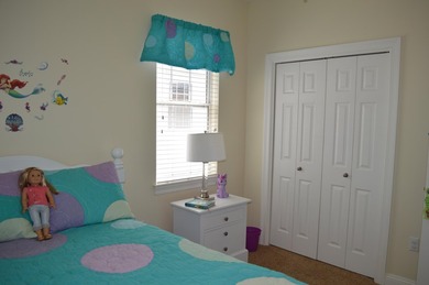 Beautiful home in quaint, white-picket-fenced, gated community on Fairway Oaks at Magnolia Golf Course in Florida - for sale on GolfHomes.com, golf home, golf lot