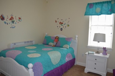 Beautiful home in quaint, white-picket-fenced, gated community on Fairway Oaks at Magnolia Golf Course in Florida - for sale on GolfHomes.com, golf home, golf lot