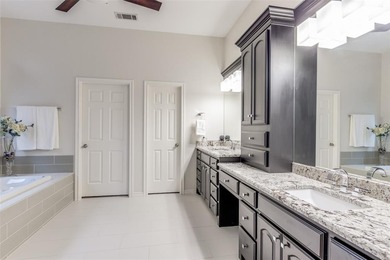 From the moment you drive up, it's clear this home is set apart on Stonebridge Ranch Country Club in Texas - for sale on GolfHomes.com, golf home, golf lot