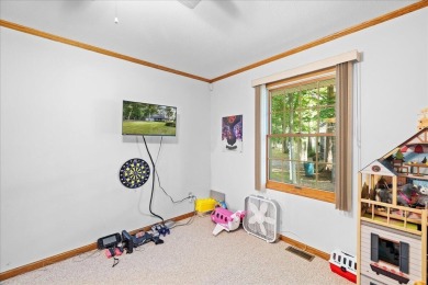 Welcome to this spacious 3-bedroom, 2-bath home offering over 1 on White Deer Country Club in Michigan - for sale on GolfHomes.com, golf home, golf lot
