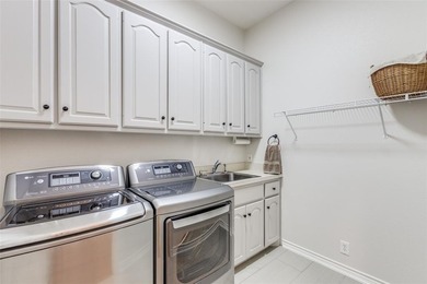 From the moment you drive up, it's clear this home is set apart on Stonebridge Ranch Country Club in Texas - for sale on GolfHomes.com, golf home, golf lot