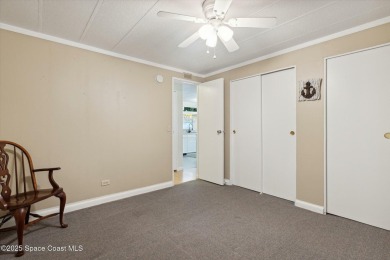 Welcome to Barefoot Bay! This 2 bedroom, 2 bath home is walking on Barefoot Bay Golf Course in Florida - for sale on GolfHomes.com, golf home, golf lot