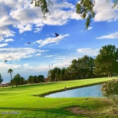 Step into this beautifully updated, move-in-ready end unit in on Fountain of the Sun Country Club in Arizona - for sale on GolfHomes.com, golf home, golf lot