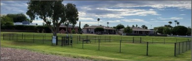 Step into this beautifully updated, move-in-ready end unit in on Fountain of the Sun Country Club in Arizona - for sale on GolfHomes.com, golf home, golf lot