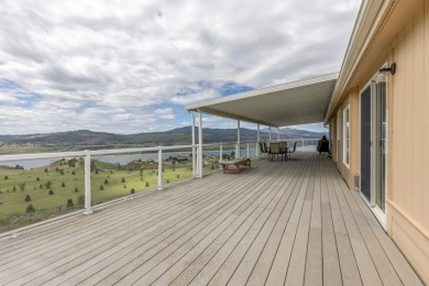 **Stunning Three-Bedroom Home on Lake Roosevelt!**  Discover on Deer Meadows Golf Course in Washington - for sale on GolfHomes.com, golf home, golf lot