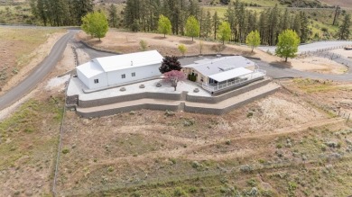 **Stunning Three-Bedroom Home on Lake Roosevelt!**  Discover on Deer Meadows Golf Course in Washington - for sale on GolfHomes.com, golf home, golf lot
