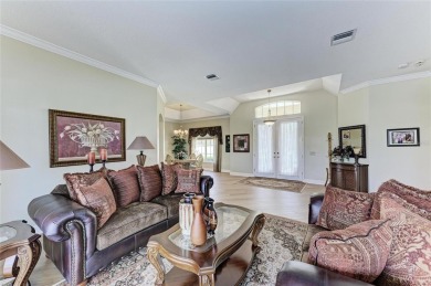 Welcome to this beautifully updated 4-bedroom, 3-bathroom home on Misty Creek Country Club in Florida - for sale on GolfHomes.com, golf home, golf lot