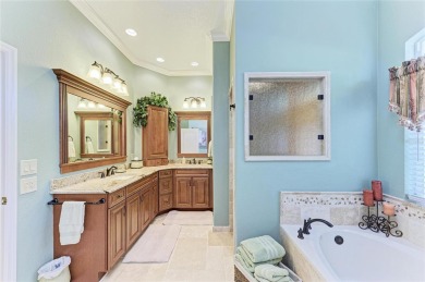 Welcome to this beautifully updated 4-bedroom, 3-bathroom home on Misty Creek Country Club in Florida - for sale on GolfHomes.com, golf home, golf lot