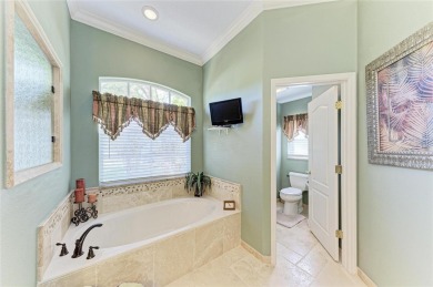 Welcome to this beautifully updated 4-bedroom, 3-bathroom home on Misty Creek Country Club in Florida - for sale on GolfHomes.com, golf home, golf lot
