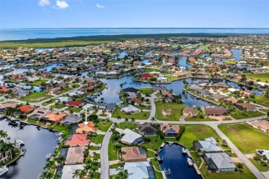 Under contract-accepting backup offers. PUNTA GORDA ISLES! on Saint Andrews South Golf Club in Florida - for sale on GolfHomes.com, golf home, golf lot