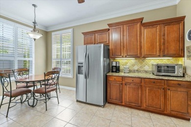Large luxurious townhome in the esteemed gated Golden Eagle golf on Golden Eagle Country Club in Florida - for sale on GolfHomes.com, golf home, golf lot