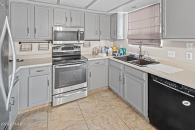 Nestled in a highly desirable central neighborhood, this on London Bridge Golf Course in Arizona - for sale on GolfHomes.com, golf home, golf lot