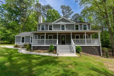 Welcome home to this stunning farmhouse-style home nestled on an on Canongate At Flat Creek Club in Georgia - for sale on GolfHomes.com, golf home, golf lot