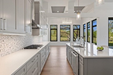 Welcome to 105 Barefoot - an exceptional Hill Country modern on Ram Rock Golf Course in Texas - for sale on GolfHomes.com, golf home, golf lot