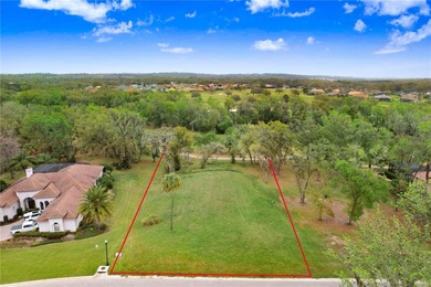 Nestled within the exclusive, gated enclave of Lake Jovita, this on Lake Jovita Golf and Country Club in Florida - for sale on GolfHomes.com, golf home, golf lot