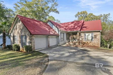 This beautifully updated home, with potential for four bedrooms on Lake Forest Yacht and Country Club in Alabama - for sale on GolfHomes.com, golf home, golf lot