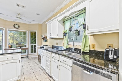 This beautifully updated home, with potential for four bedrooms on Lake Forest Yacht and Country Club in Alabama - for sale on GolfHomes.com, golf home, golf lot