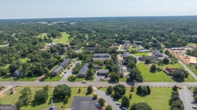 The Weeks Group is pleased to offer Country Club Apartments, a on Southwestern Golf Links in Georgia - for sale on GolfHomes.com, golf home, golf lot