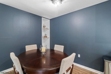 Flooded with natural light, this bright and airy end-unit condo on Quail Brook Golf Course in New Jersey - for sale on GolfHomes.com, golf home, golf lot