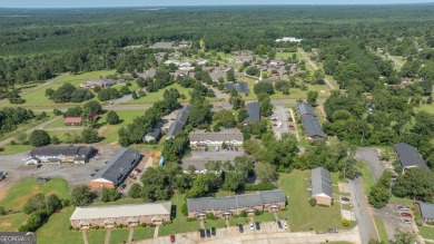 The Weeks Group is pleased to offer Country Club Apartments, a on Southwestern Golf Links in Georgia - for sale on GolfHomes.com, golf home, golf lot