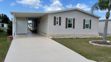 This 2 bedroom/2 bath home is 1204 sq ft. of living space, plus on Sabal Springs Golf and Racquet Club in Florida - for sale on GolfHomes.com, golf home, golf lot