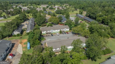 The Weeks Group is pleased to offer Country Club Apartments, a on Southwestern Golf Links in Georgia - for sale on GolfHomes.com, golf home, golf lot