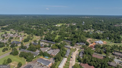 The Weeks Group is pleased to offer Country Club Apartments, a on Southwestern Golf Links in Georgia - for sale on GolfHomes.com, golf home, golf lot