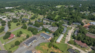 The Weeks Group is pleased to offer Country Club Apartments, a on Southwestern Golf Links in Georgia - for sale on GolfHomes.com, golf home, golf lot