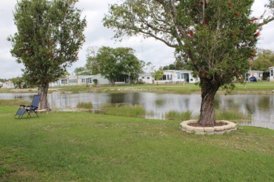 This 2 bedroom/2 bath home is 1204 sq ft. of living space, plus on Sabal Springs Golf and Racquet Club in Florida - for sale on GolfHomes.com, golf home, golf lot