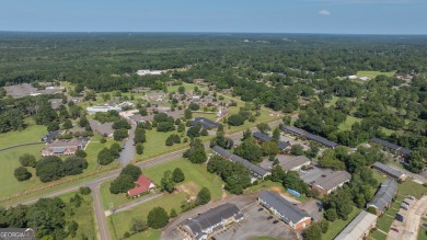 The Weeks Group is pleased to offer Country Club Apartments, a on Southwestern Golf Links in Georgia - for sale on GolfHomes.com, golf home, golf lot