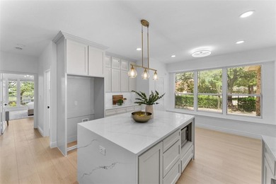 This fully renovated showstopper sits on an oversized half acre on The Shores Country Club in Texas - for sale on GolfHomes.com, golf home, golf lot