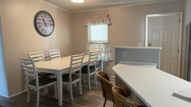 This 2 bedroom/2 bath home is 1204 sq ft. of living space, plus on Sabal Springs Golf and Racquet Club in Florida - for sale on GolfHomes.com, golf home, golf lot