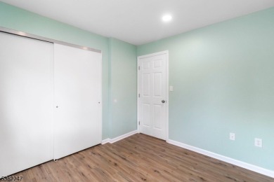 Flooded with natural light, this bright and airy end-unit condo on Quail Brook Golf Course in New Jersey - for sale on GolfHomes.com, golf home, golf lot