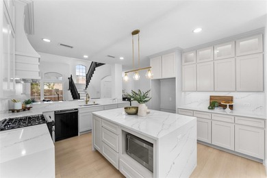 This fully renovated showstopper sits on an oversized half acre on The Shores Country Club in Texas - for sale on GolfHomes.com, golf home, golf lot