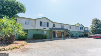 The Weeks Group is pleased to offer Country Club Apartments, a on Southwestern Golf Links in Georgia - for sale on GolfHomes.com, golf home, golf lot