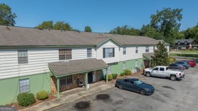 The Weeks Group is pleased to offer Country Club Apartments, a on Southwestern Golf Links in Georgia - for sale on GolfHomes.com, golf home, golf lot