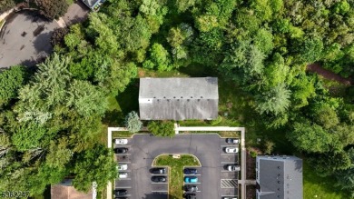 Flooded with natural light, this bright and airy end-unit condo on Quail Brook Golf Course in New Jersey - for sale on GolfHomes.com, golf home, golf lot