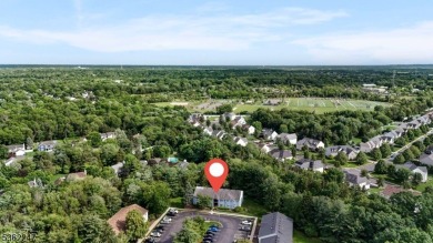 Flooded with natural light, this bright and airy end-unit condo on Quail Brook Golf Course in New Jersey - for sale on GolfHomes.com, golf home, golf lot
