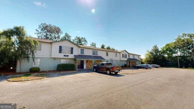 The Weeks Group is pleased to offer Country Club Apartments, a on Southwestern Golf Links in Georgia - for sale on GolfHomes.com, golf home, golf lot