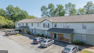 The Weeks Group is pleased to offer Country Club Apartments, a on Southwestern Golf Links in Georgia - for sale on GolfHomes.com, golf home, golf lot