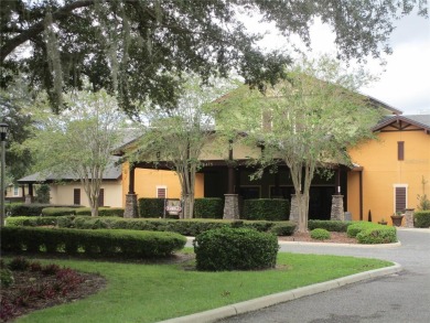 PRICE CHANGE! Nestled on a peaceful golf course, this beautiful on Arlington Ridge Golf Club in Florida - for sale on GolfHomes.com, golf home, golf lot