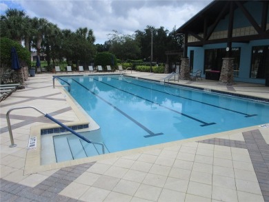 PRICE CHANGE! Nestled on a peaceful golf course, this beautiful on Arlington Ridge Golf Club in Florida - for sale on GolfHomes.com, golf home, golf lot