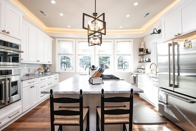 WATERFRONT in Bay Creek *Bahama Blue* - Grand Bahama-style on Bay Creek Golf Club in Virginia - for sale on GolfHomes.com, golf home, golf lot