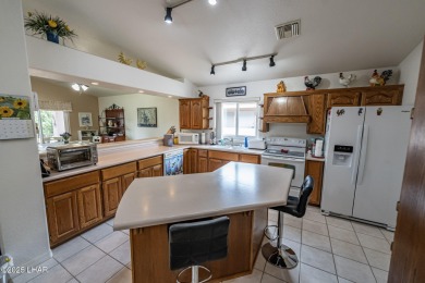 LOVELY 3-BED, 2-BATH HOME IN A GREAT SPOT!! This well-kept on Cerbat Cliffs Golf Course in Arizona - for sale on GolfHomes.com, golf home, golf lot
