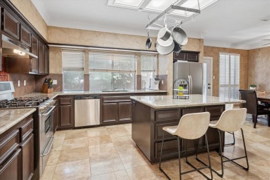 Welcome to this beautiful and expansive executive home on Hackberry Creek Country Club in Texas - for sale on GolfHomes.com, golf home, golf lot