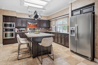 Welcome to this beautiful and expansive executive home on Hackberry Creek Country Club in Texas - for sale on GolfHomes.com, golf home, golf lot